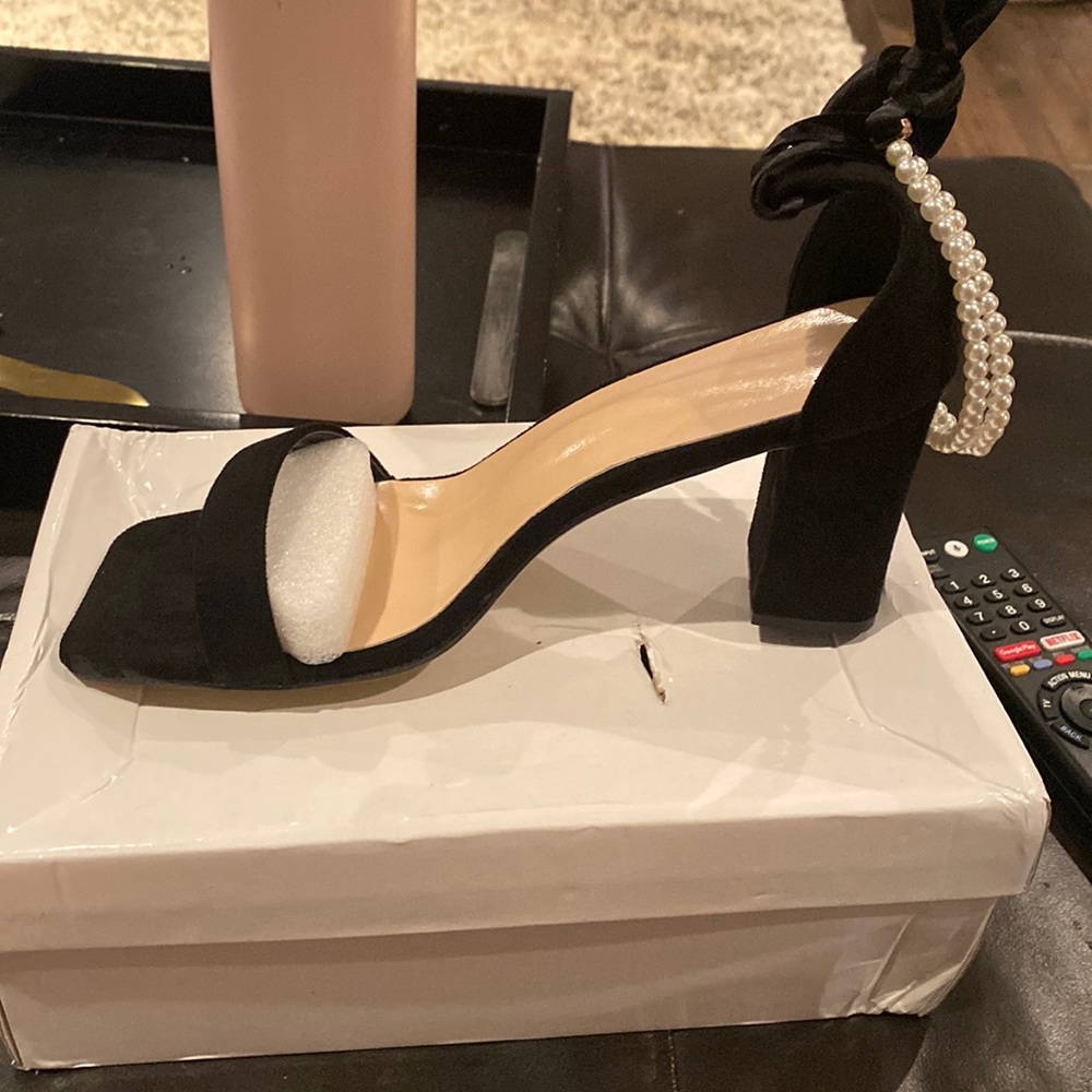 Black ankle strap with a 2 inch heel